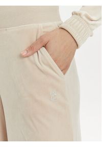 Juicy Couture Spodnie dresowe Audree JCWBJ23334 Beżowy Loose Fit. Kolor: beżowy. Materiał: syntetyk #5