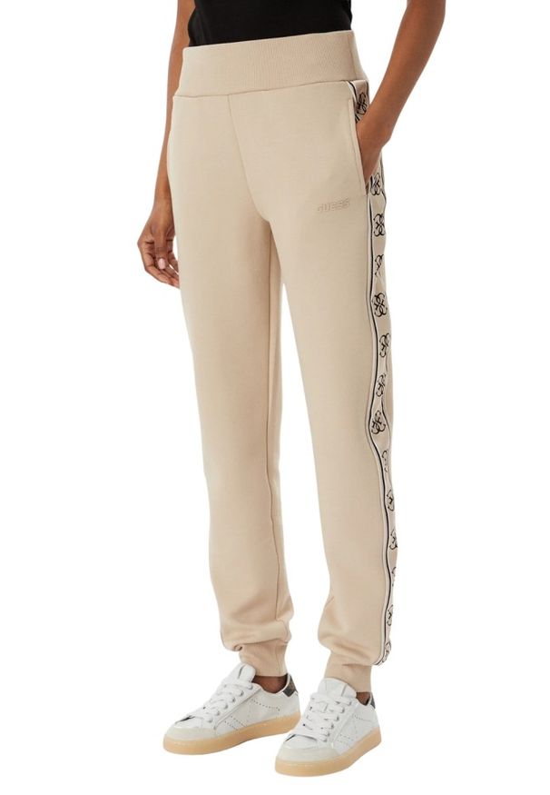 Guess - GUESS Beżowe damskie spodnie dresowe z lampasami Britney Jogger, Rozmiar M. Kolor: beżowy. Materiał: dresówka