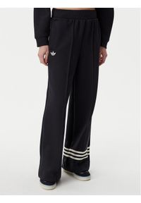 Adidas - adidas Spodnie dresowe adicolor Neuclassics JI8516 Czarny Loose Fit. Kolor: czarny. Materiał: syntetyk, bawełna #1
