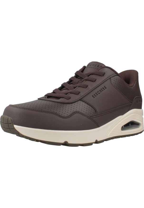 skechers - Kapcie SKECHERS UNO-BANKSIA LUXE Brązowy. Kolor: brązowy. Materiał: syntetyk, tkanina. Model: Skechers Sport. Sport: turystyka piesza