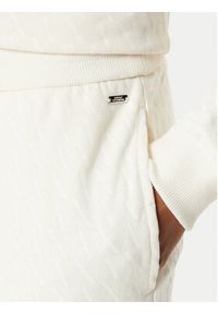 Armani Exchange Spodnie dresowe 8NYPLG YJE5Z 1130 Beżowy Regular Fit. Kolor: beżowy. Materiał: bawełna