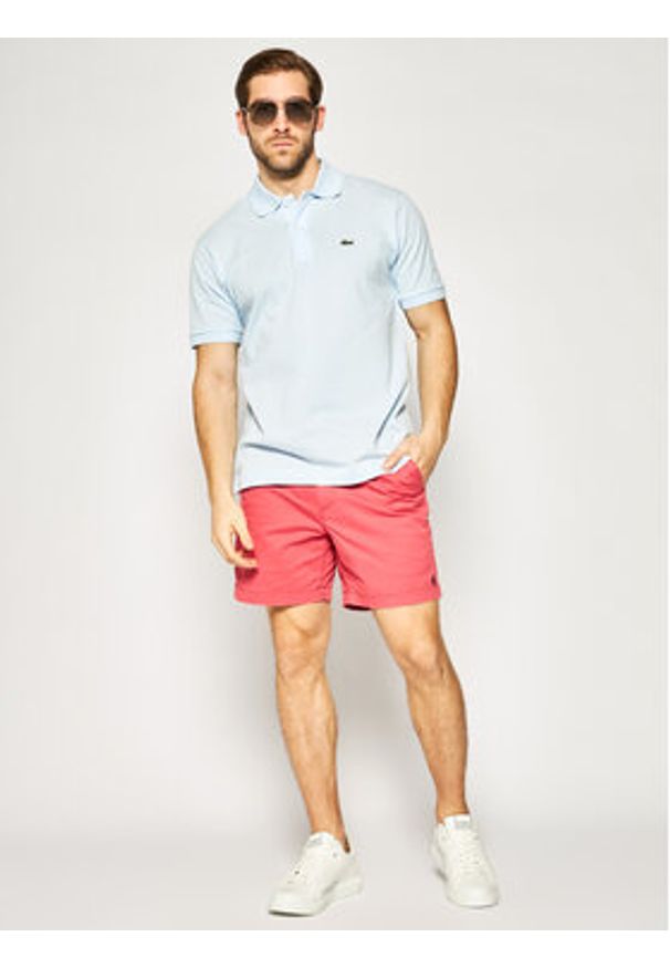 Lacoste Polo L1212 Niebieski Classic Fit. Typ kołnierza: polo. Kolor: niebieski. Materiał: bawełna