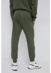 Diadora Spodnie męskie kolor zielony gładkie. Kolor: zielony. Materiał: bawełna. Wzór: gładki