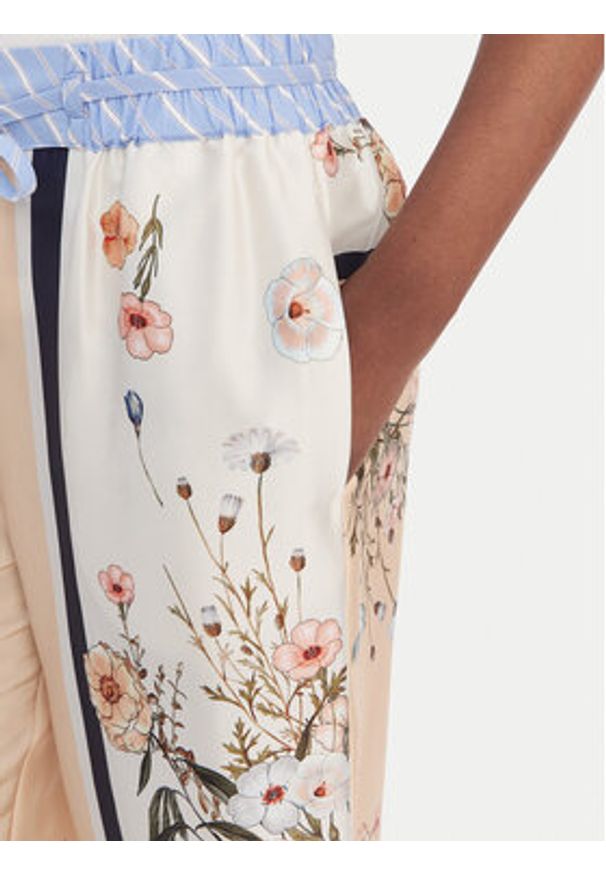 Liu Jo Spodnie materiałowe WA6358 T2555 Beżowy Relaxed Fit. Kolor: beżowy. Materiał: syntetyk