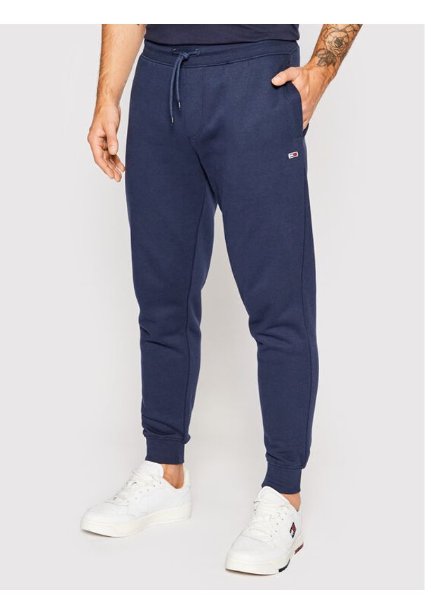 Tommy Jeans Spodnie dresowe DM0DM15380 Granatowy Slim Fit. Kolor: niebieski. Materiał: bawełna, syntetyk