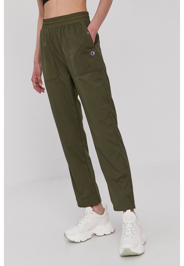 Champion Spodnie 113801 damskie kolor zielony. Kolor: zielony. Materiał: tkanina. Wzór: gładki