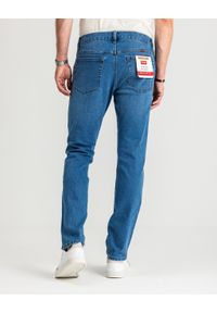 Wrangler - MESKIE SPODNIE WRANGLER RUSTLER REGULAR ABYSS BLUE 112356516 W100018376. Okazja: na co dzień, do pracy. Styl: klasyczny, casual, elegancki #4