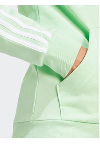 Adidas - adidas Bluza Essentials 3-Stripes IR6077 Zielony Regular Fit. Kolor: zielony. Materiał: bawełna