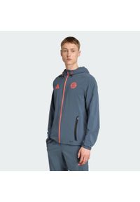 Adidas - Kurtka FC Bayern Tiro 25 Competition Vis Tech Travell. Kolor: szary, pomarańczowy, wielokolorowy. Materiał: dresówka. Sport: piłka nożna