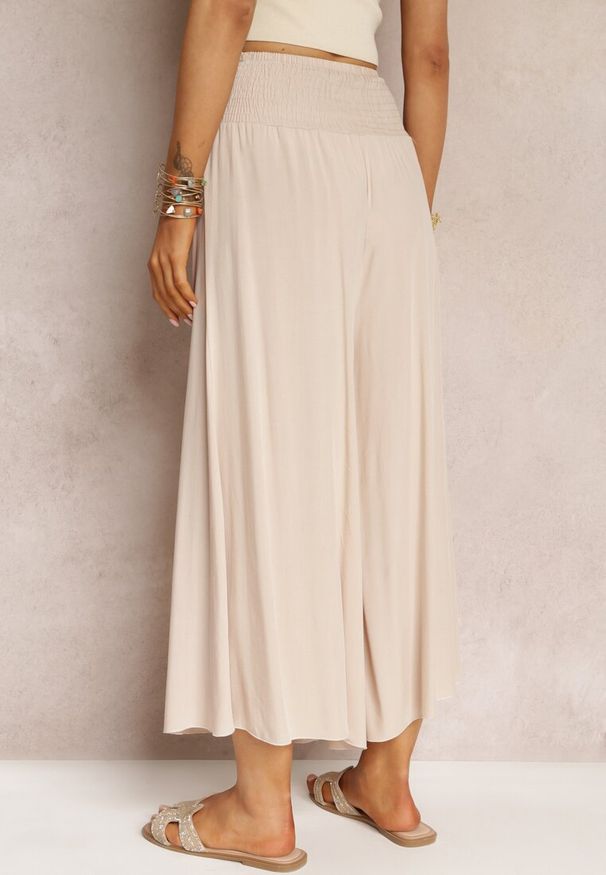 Renee - Jasnobeżowe Szerokie Spodnie High Waist o Długości 7/8 Rathi. Stan: podwyższony. Kolor: beżowy. Materiał: tkanina, wiskoza