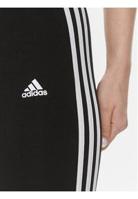 Adidas - adidas Legginsy Loungewear Essentials 3-Stripes GL0723 Czarny Extra Slim Fit. Kolor: czarny. Materiał: bawełna