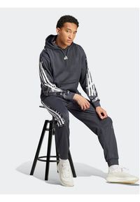 Adidas - adidas Spodnie dresowe Future Icons Allover Print IB6127 Szary Regular Fit. Kolor: szary. Materiał: syntetyk. Wzór: nadruk #4