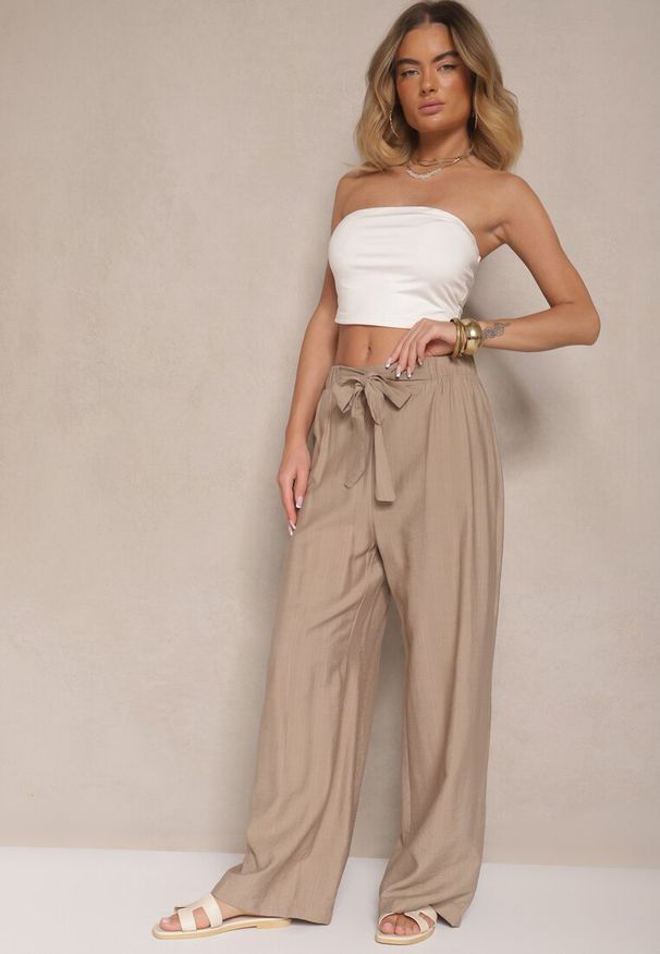 Renee - Ciemnobeżowe Spodnie z Wiskozy o Szerokim Kroju z Kokardą Ellioria. Okazja: na co dzień, na spacer. Kolor: beżowy. Materiał: wiskoza. Styl: elegancki, casual