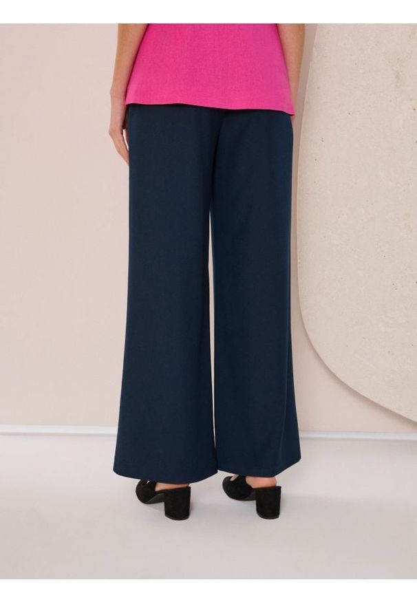 Sinsay - Spodnie palazzo - granatowy. Kolor: niebieski