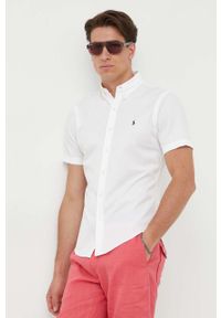 Polo Ralph Lauren koszula bawełniana męska kolor biały regular z kołnierzykiem button-down. Okazja: na co dzień. Typ kołnierza: button down, polo. Kolor: biały. Materiał: bawełna. Długość rękawa: krótki rękaw. Długość: krótkie. Wzór: aplikacja. Styl: casual
