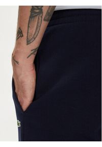 Lacoste Spodnie dresowe XH9624 Granatowy Regular Fit. Kolor: niebieski. Materiał: bawełna #4