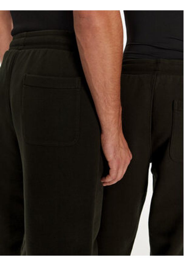 AMI PARIS Spodnie dresowe UTR240.JE0091 Brązowy Regular Fit. Kolor: brązowy. Materiał: bawełna