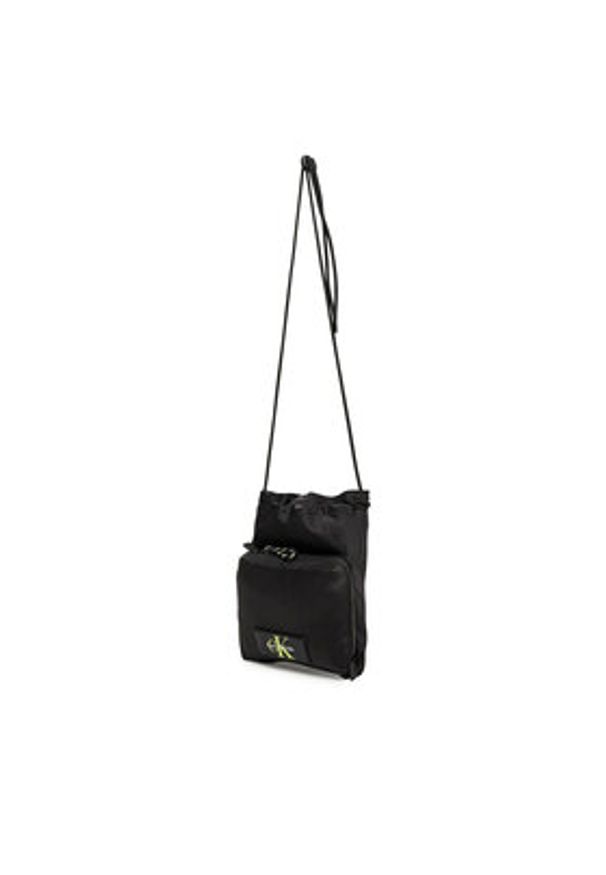 Calvin Klein Saszetka Tech Utility Small Cb LV04G1079G Czarny. Kolor: czarny. Materiał: materiał