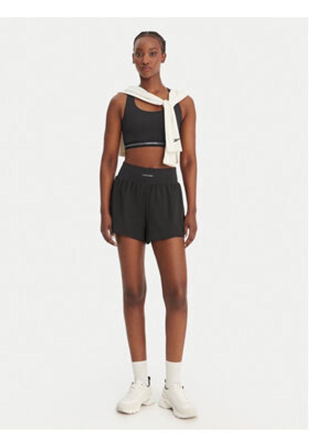 Calvin Klein Performance Szorty sportowe LVGWS6S802 Czarny Regular Fit. Kolor: czarny. Materiał: syntetyk