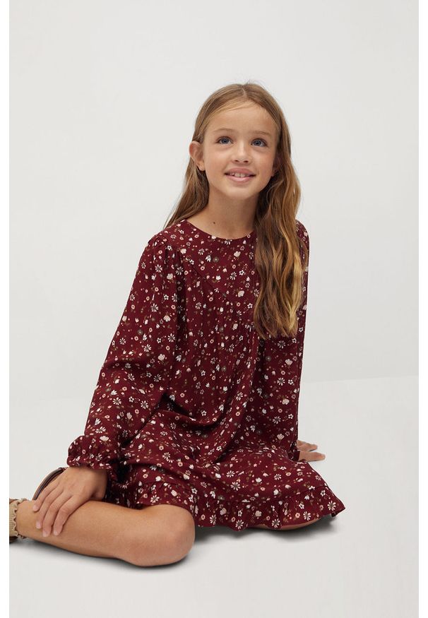 Mango Kids - Sukienka dziecięca Grace 110-152 cm. Kolor: brązowy. Materiał: tkanina, wiskoza. Długość rękawa: długi rękaw. Wzór: kwiaty. Typ sukienki: rozkloszowane. Długość: mini