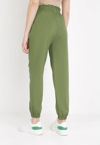 Born2be - Zielone Spodnie Sophilla. Kolor: zielony. Materiał: materiał, tkanina. Długość: krótkie. Sezon: lato #6