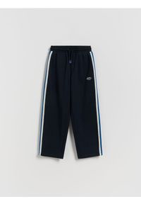 Reserved - Bawełniane spodnie - granatowy. Kolor: niebieski. Materiał: bawełna #1