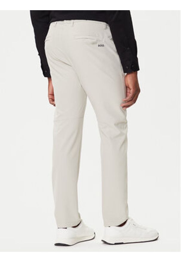 BOSS Spodnie materiałowe T_Commuter 50534303 Beżowy Slim Fit. Kolor: beżowy. Materiał: syntetyk