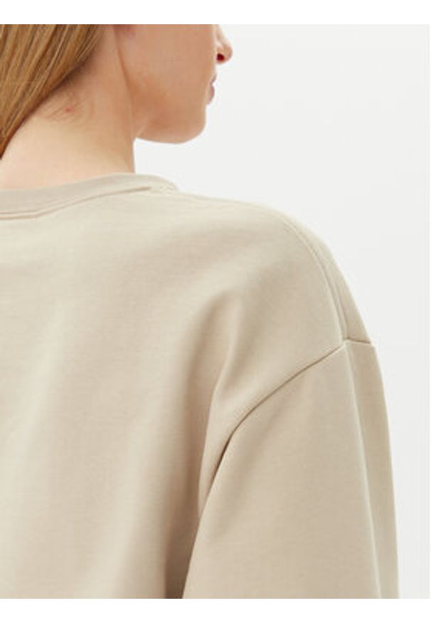 Calvin Klein Jeans Bluza LV047B234G Beżowy Relaxed Fit. Kolor: beżowy. Materiał: bawełna