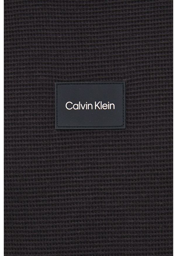 Calvin Klein - Bluza bawełniana. Okazja: na co dzień. Kolor: czarny. Materiał: bawełna. Wzór: gładki. Styl: casual