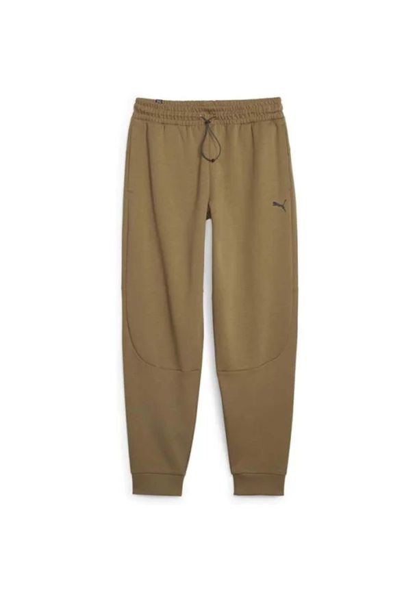 Spodnie Mężczyzna Puma Rad/Cal Dk Op brązowy. Kolor: zielony. Sport: fitness