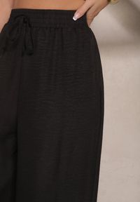 Renee - Czarne Szerokie Spodnie High Waist Ozdobione Wiązaniem Telonia. Okazja: na co dzień. Stan: podwyższony. Kolor: czarny. Wzór: aplikacja. Styl: elegancki, casual #2