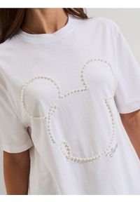 Sinsay - Bawełniana koszulka z aplikacją 3D Minnie Mouse - kremowy. Kolor: kremowy. Materiał: bawełna. Wzór: motyw z bajki, aplikacja #1