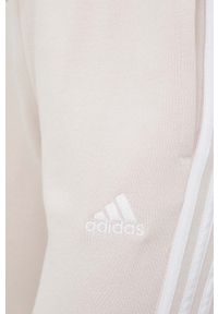 Adidas - adidas spodnie dresowe kolor różowy z aplikacją. Kolor: różowy. Materiał: dresówka. Wzór: aplikacja #4