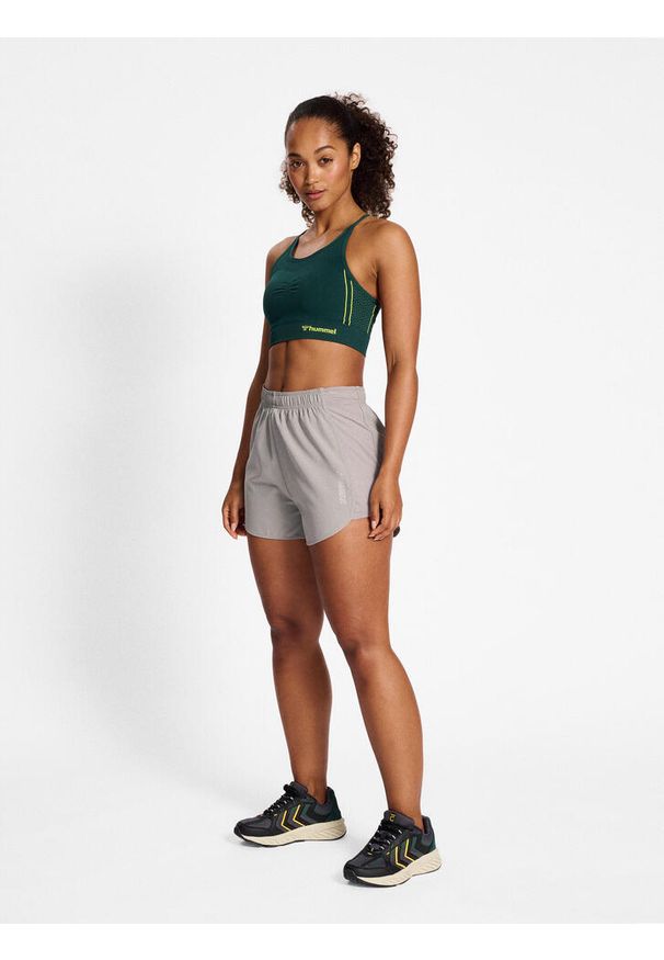 Bezszwowy biustonosz dla kobiet Hummel MT Zome. Kolor: zielony. Sport: joga i pilates, fitness