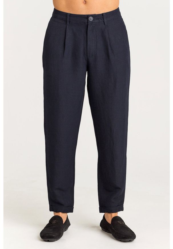 Niebieskie spodnie Armani Exchange z aplikacjami