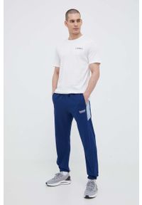 Hummel spodnie dresowe bawełniane kolor granatowy gładkie. Kolor: niebieski. Materiał: bawełna, dresówka. Wzór: gładki #2