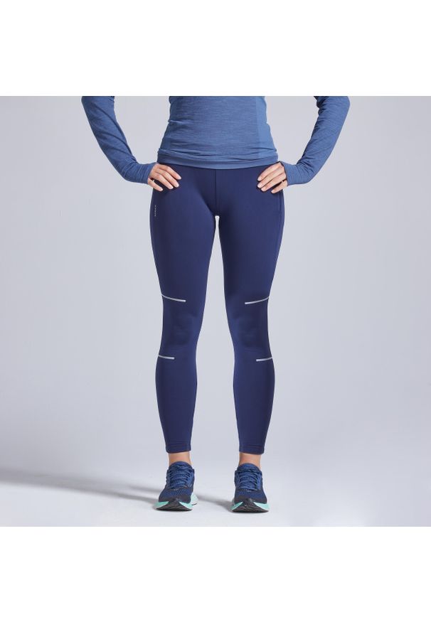 KIPRUN - Legginsy do biegania damskie Kiprun Warm ocieplane. Kolor: niebieski. Materiał: elastan, poliester, materiał. Sezon: zima. Sport: bieganie, fitness