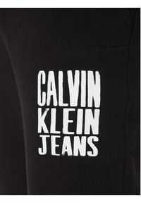 Calvin Klein Jeans Spodnie dresowe Painted J30J327535 Czarny Regular Fit. Kolor: czarny. Materiał: bawełna