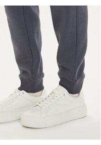 Calvin Klein Jeans Spodnie dresowe Monologo J20J223590 Szary Relaxed Fit. Kolor: szary. Materiał: syntetyk, bawełna #3