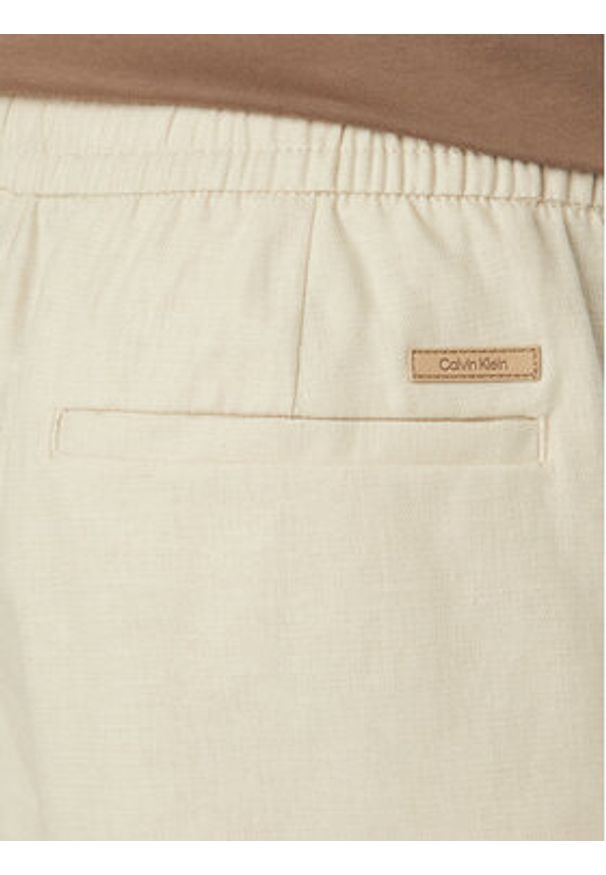 Calvin Klein Szorty materiałowe LV04LF620G Beżowy jasny Straight Fit. Kolor: beżowy. Materiał: bawełna