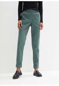 bonprix - Spodnie chino ze stretchem, z wygodnym paskiem w talii i wywijanymi nogawkami. Kolor: zielony