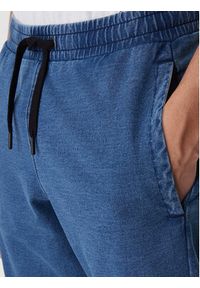 Reebok Spodnie dresowe Ambrose RK25543CCM Niebieski Regular Fit. Kolor: niebieski. Materiał: bawełna #3