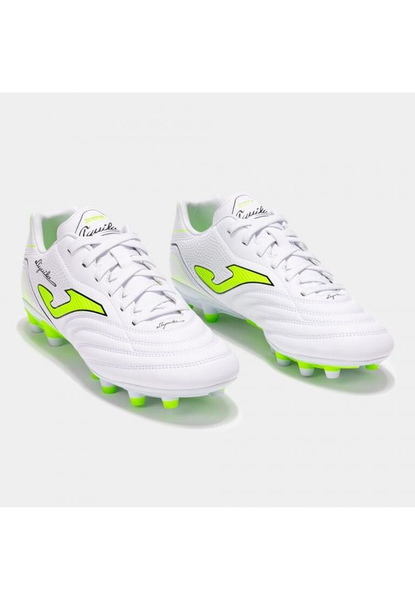 Buty piłkarskie męskie Joma BUTYJOMAAGUS2502FGAGUILA2502WHITEFG. Zapięcie: sznurówki. Kolor: biały. Materiał: materiał. Szerokość cholewki: normalna. Sport: piłka nożna