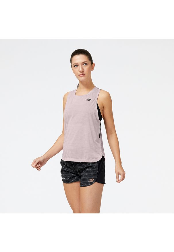 Koszulka damska New Balance WT31250SIR - różowa. Kolor: różowy. Materiał: poliester. Sezon: lato. Sport: fitness