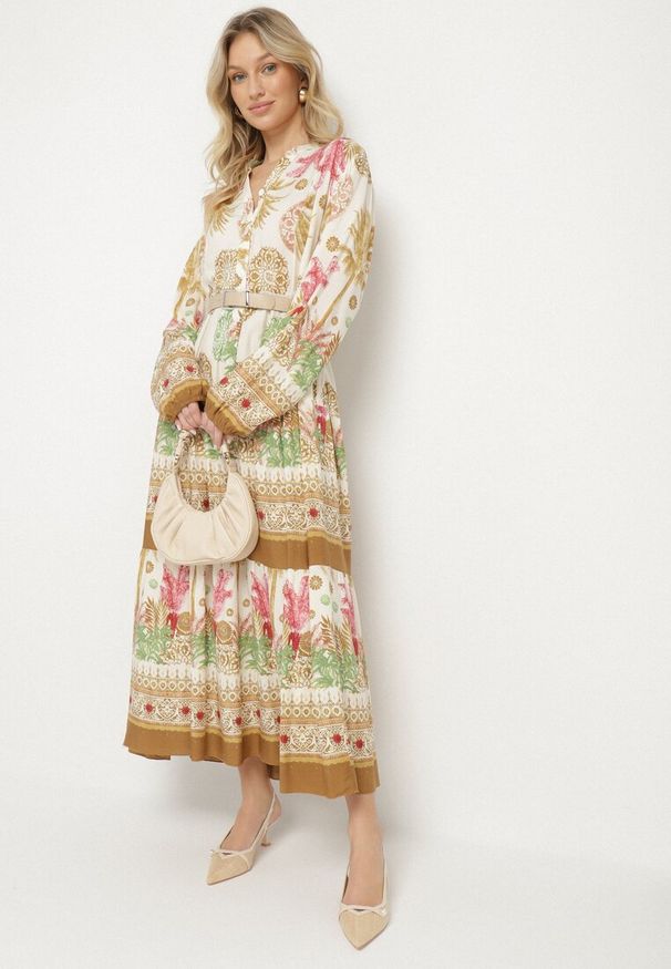 Born2be - Beżowa Wiskozowa Sukienka w Etniczne Wzory o Rozkloszowanym Kroju Xarisen. Okazja: na co dzień. Typ kołnierza: dekolt w kształcie V. Kolor: beżowy. Materiał: wiskoza. Długość rękawa: długi rękaw. Styl: elegancki, casual, klasyczny