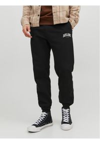 Jack & Jones - Jack&Jones Spodnie dresowe Kane 12236479 Czarny Loose Fit. Kolor: czarny. Materiał: dresówka, syntetyk, bawełna