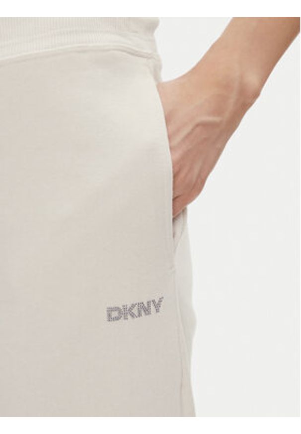 DKNY Sport Spodnie dresowe DP5P3624 Beżowy Regular Fit. Kolor: beżowy. Materiał: syntetyk, bawełna
