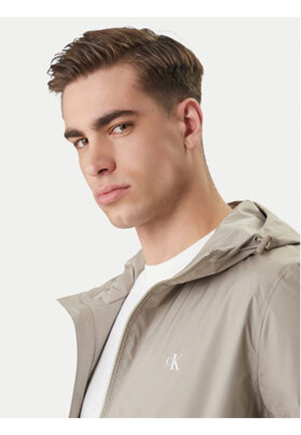 Calvin Klein Jeans Wiatrówka Harrington LV04RF521G Beżowy Regular Fit. Kolor: beżowy. Materiał: syntetyk