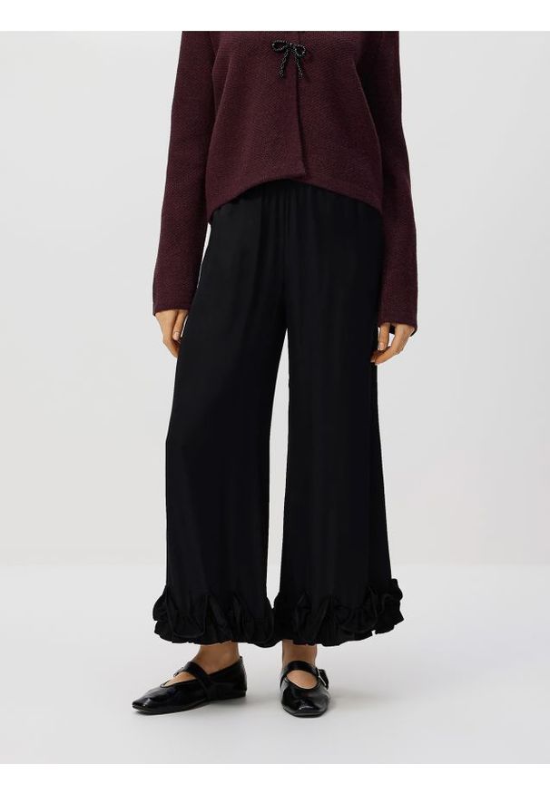 Reserved - Spodnie z wiskozy z falbankami - czarny. Kolor: czarny. Materiał: wiskoza