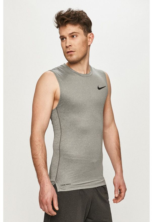 Nike - T-shirt. Kolor: szary. Materiał: tkanina, dzianina, skóra, włókno
